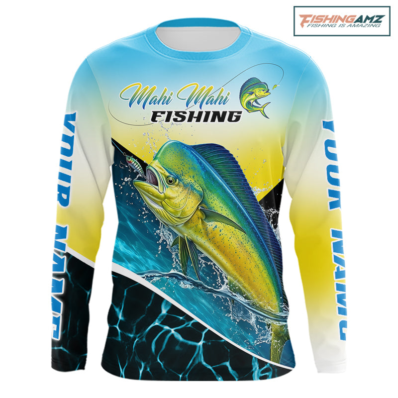 A long-sleeve crewneck fishing shirt with a vibrant Mahi Mahi fish graphic on the front, a blue-to-yellow gradient background, and 'Mahi Mahi FISHING' text across the chest. The sleeves feature 'YOUR NAME' branding.
