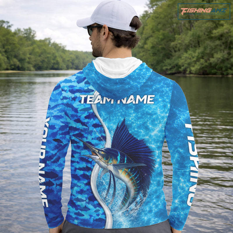 Angler wearing Sailfish fishing blue ocean camouflage performance long sleeve hooded fishing shirt on the water