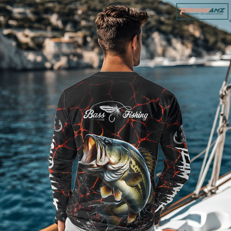 Angler wearing Orange Camo Bass Fishing Shirt Long Sleeve standing on the boat