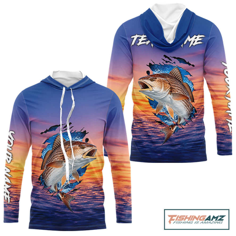 Front and back view of Redfish Fishing Sunset custom long sleeve hooded fishing shirt, redfish offshore fishing apparel with sunset redfish graphic
