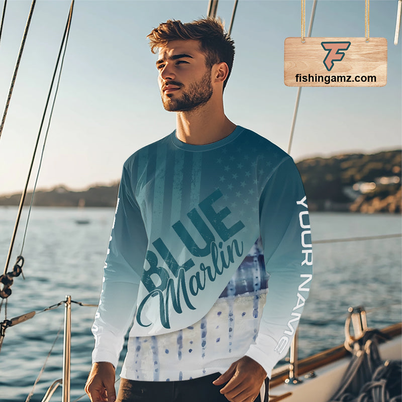 Angler wearing patriotic American Flag Marlin long sleeve fishing shirt on boat
