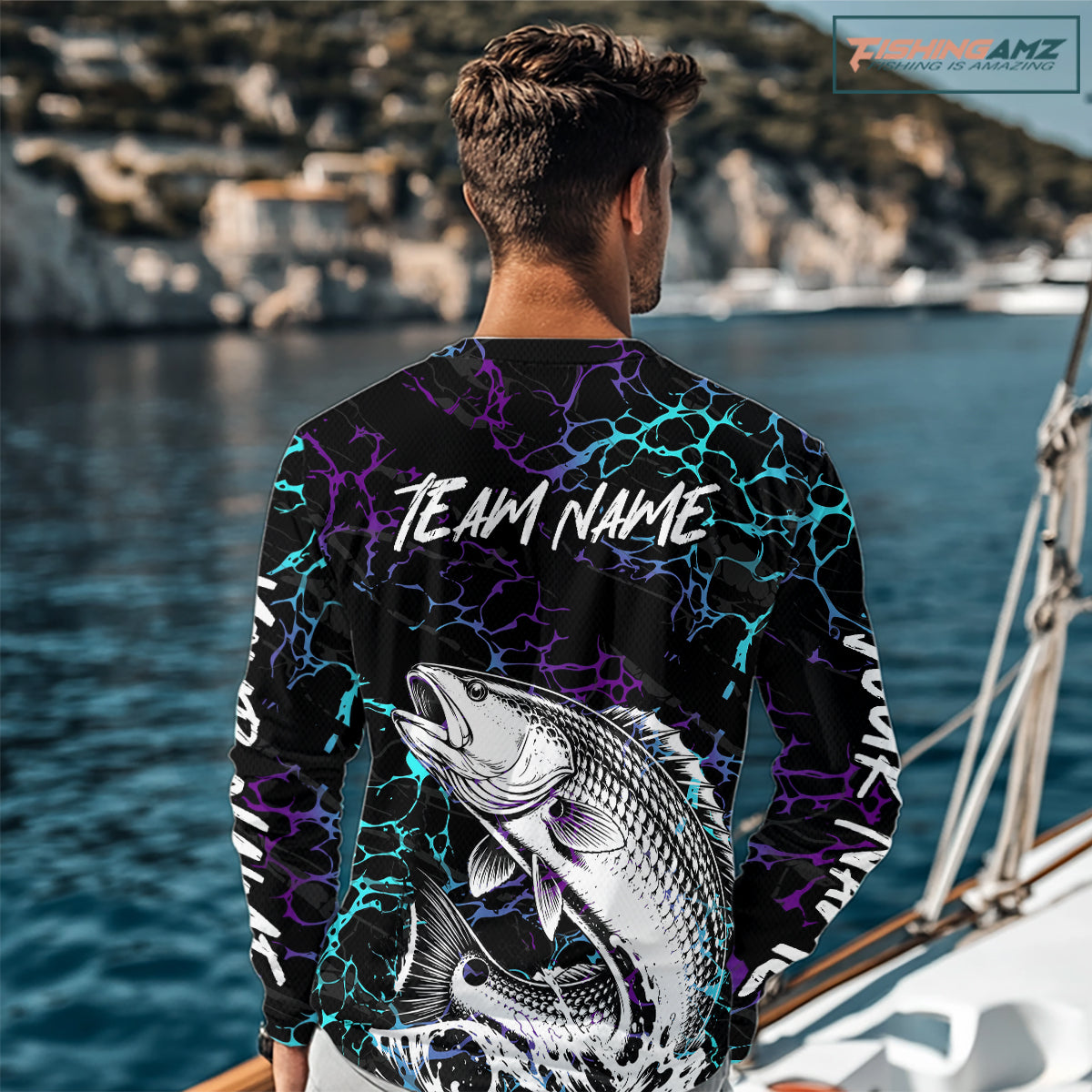 Angler wearing Redfish Fishing neon blue long sleeve saltwater fishing shirt on the boat with personalized name