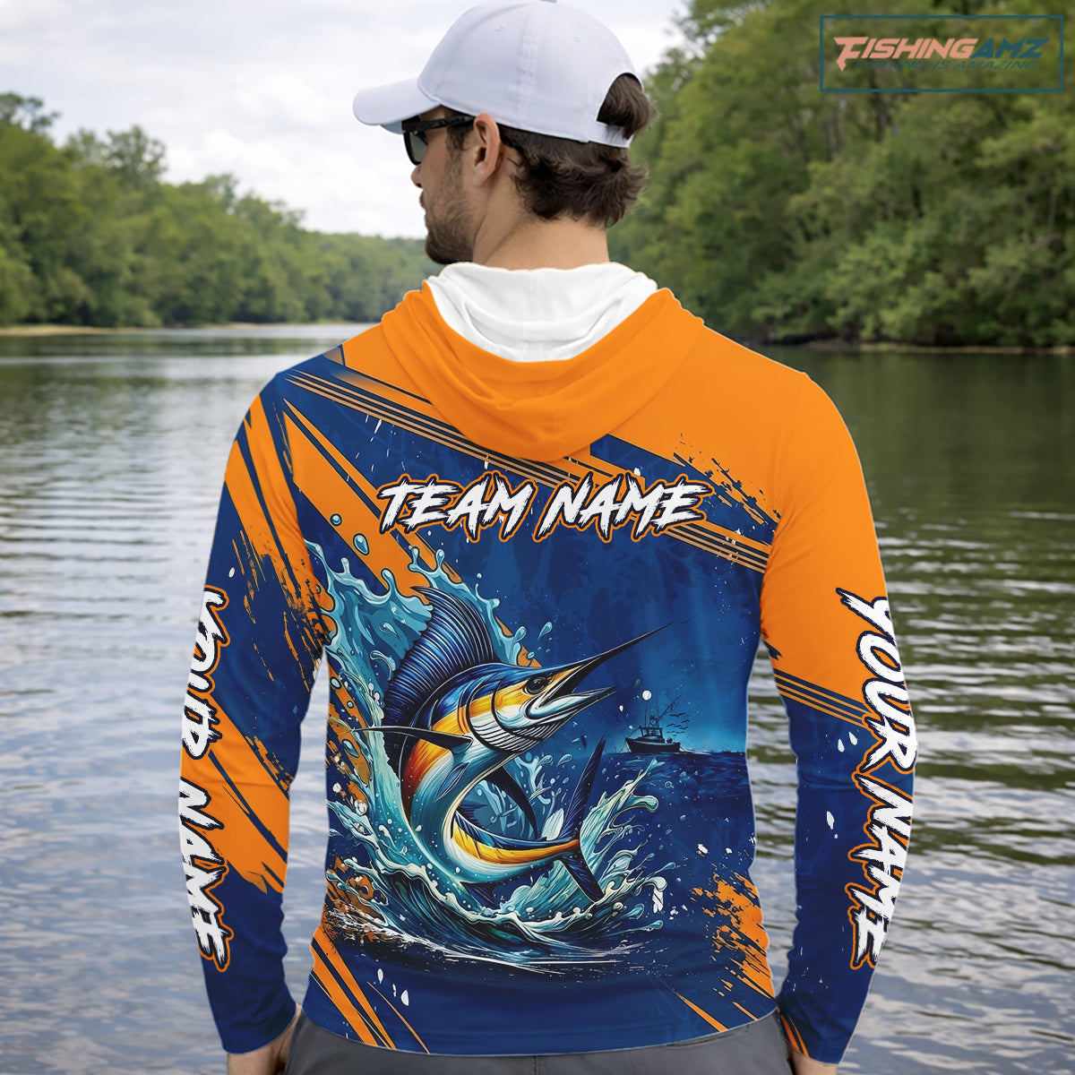 Angler wearing Custom Marlin Fishing Blue Orange long sleeve hooded saltwater fishing jersey with custom team name.