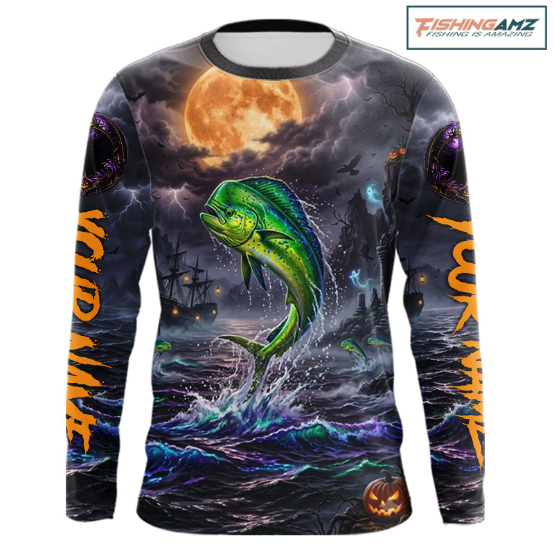 A long-sleeve crewneck shirt with an all-over Halloween graphic print featuring a green mahi-mahi jumping from dark ocean waves under a full moon, with orange 'WILD' text on the sleeves and a Fishingamz logo in the top right corner.