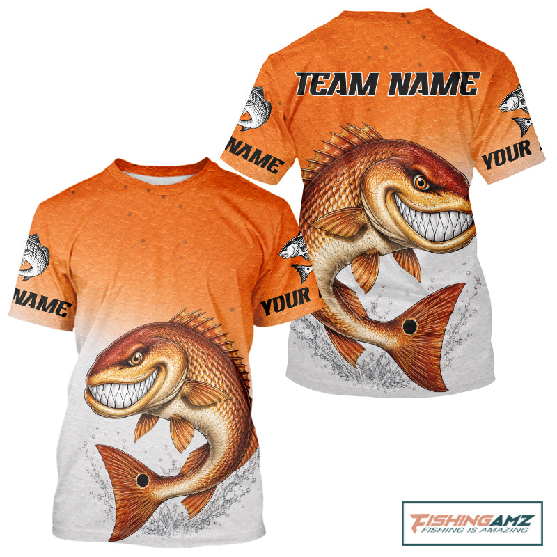 Custom short-sleeve crewneck t-shirt shown from the front and back, featuring a large orange and white gradient design with a detailed graphic of a smiling bass fish and customizable text placeholders 'TEAM NAME' and 'YOUR'.