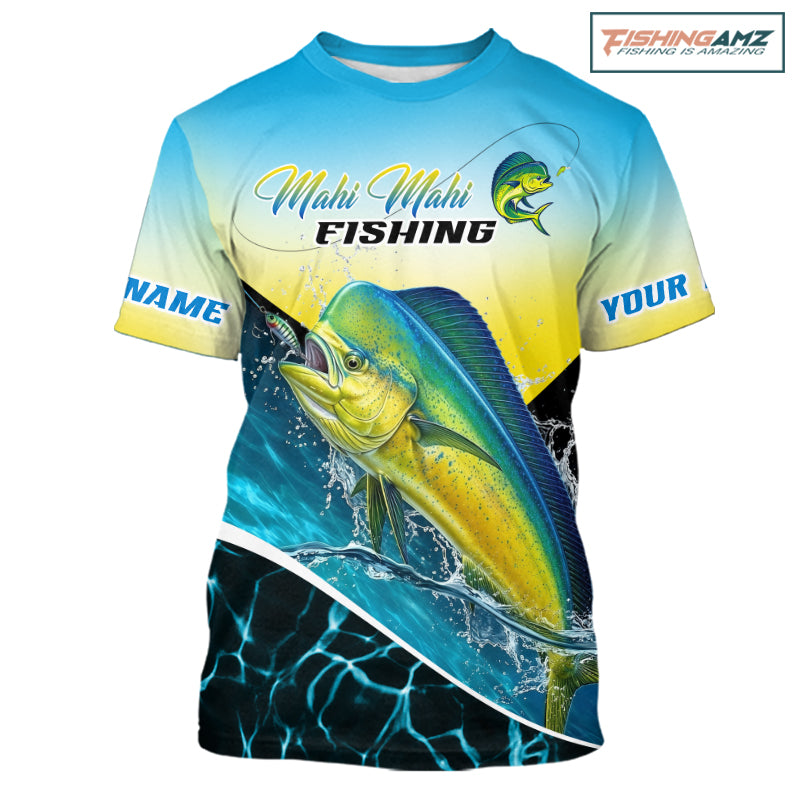 A short-sleeve graphic t-shirt featuring a Mahi Mahi fishing design. The shirt has a blue-to-yellow gradient top half with 'Mahi Mahi FISHING' text and a fish logo, and a large realistic mahi-mahi fish graphic on the front.