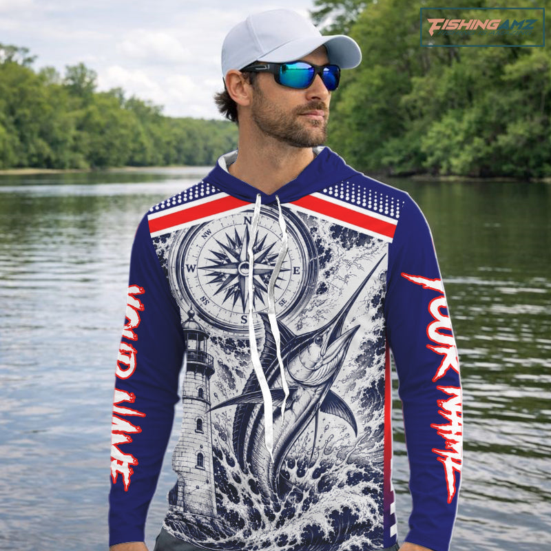 Angler wearing personalized Marlin blue long sleeve hooded performance fishing shirt on the water