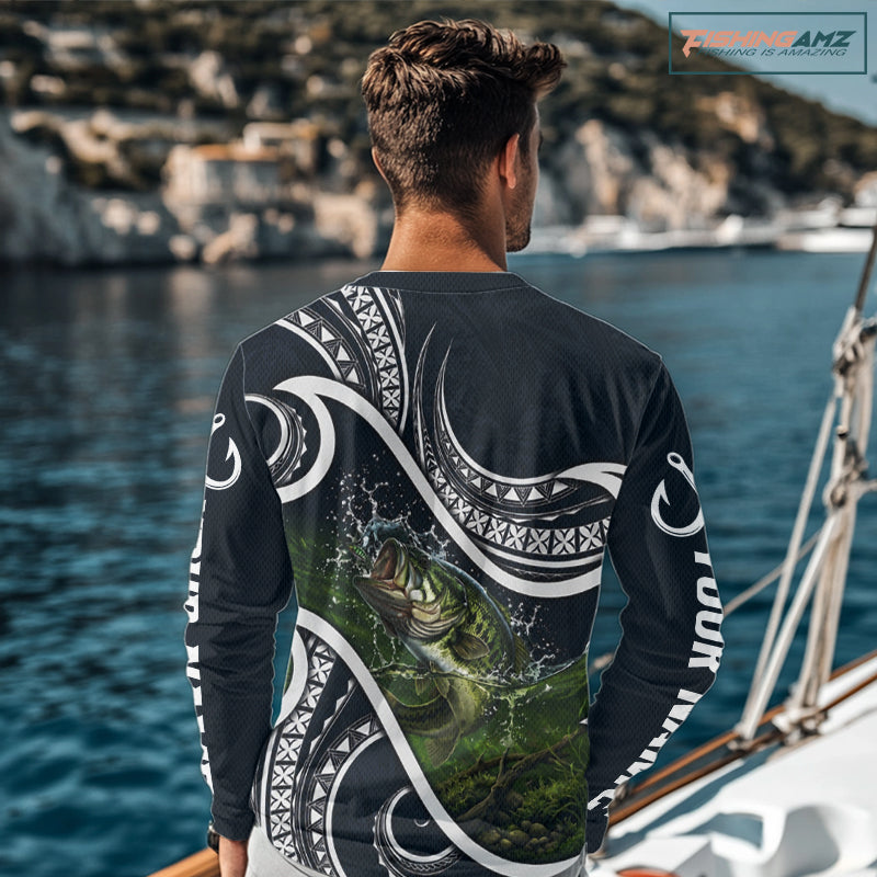 Angler wearing blue tribal pattern custom largemouth bass long sleeve fishing shirt on the water