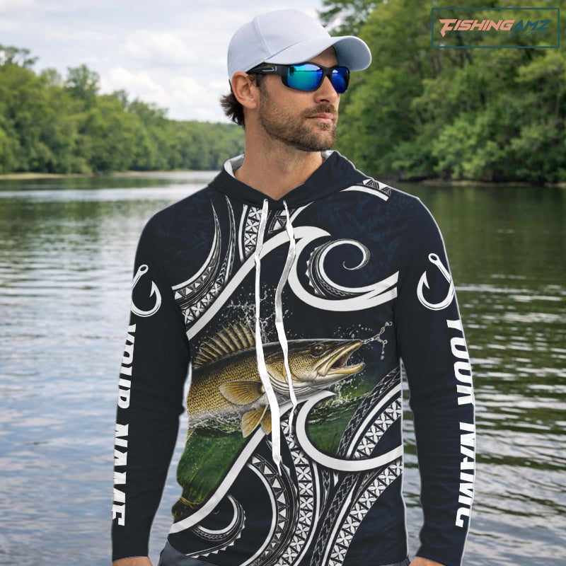 Angler wearing blue tribal pattern custom walleye long sleeve fishing shirt on the water