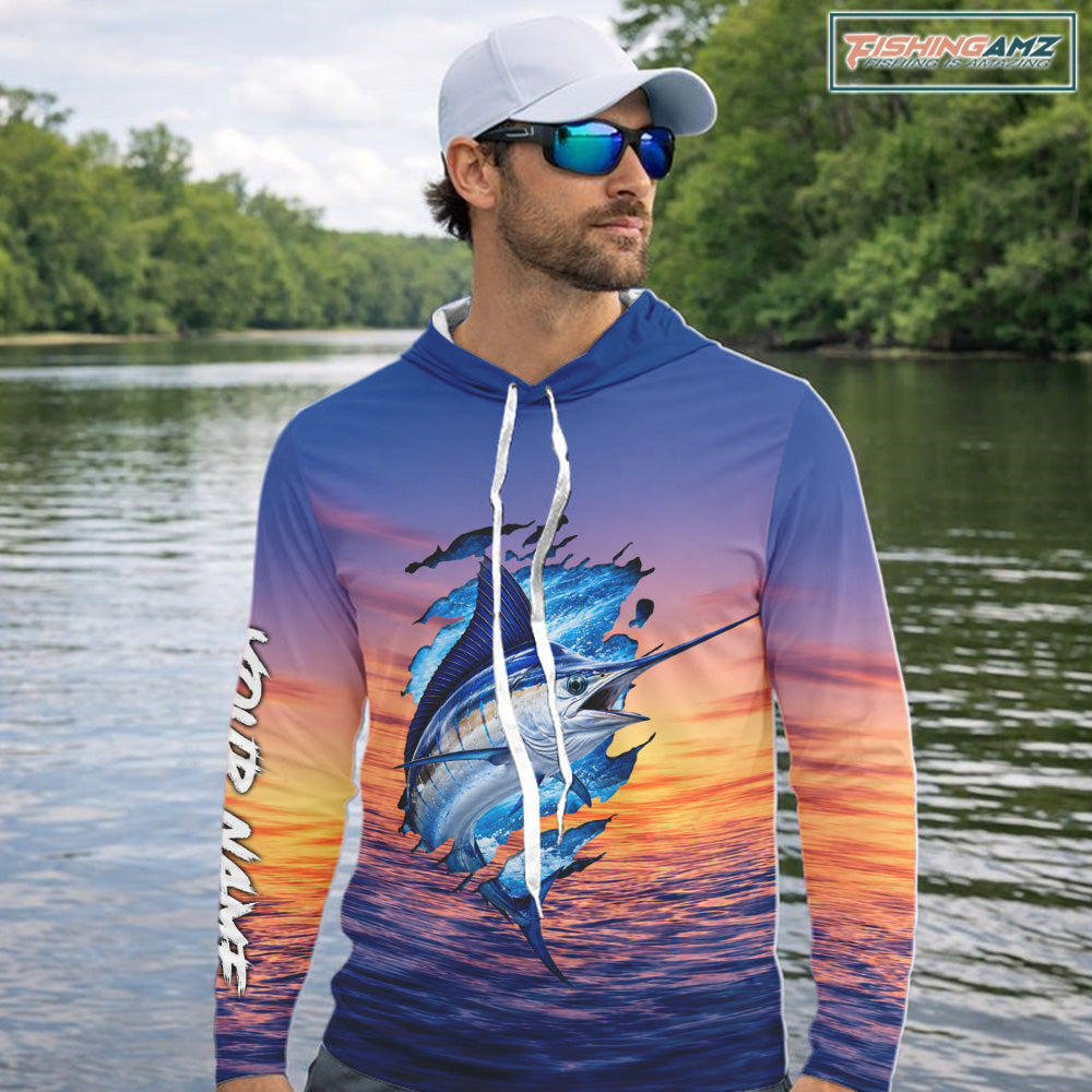 Angler wearing Marlin Fishing Sunset custom long sleeve hooded marlin offshore fishing shirt at sunset