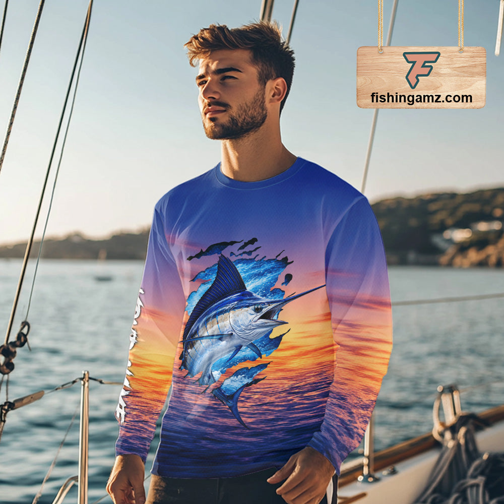 Angler wearing Marlin Fishing Sunset custom long sleeve marlin offshore fishing shirt on the boat at sunset