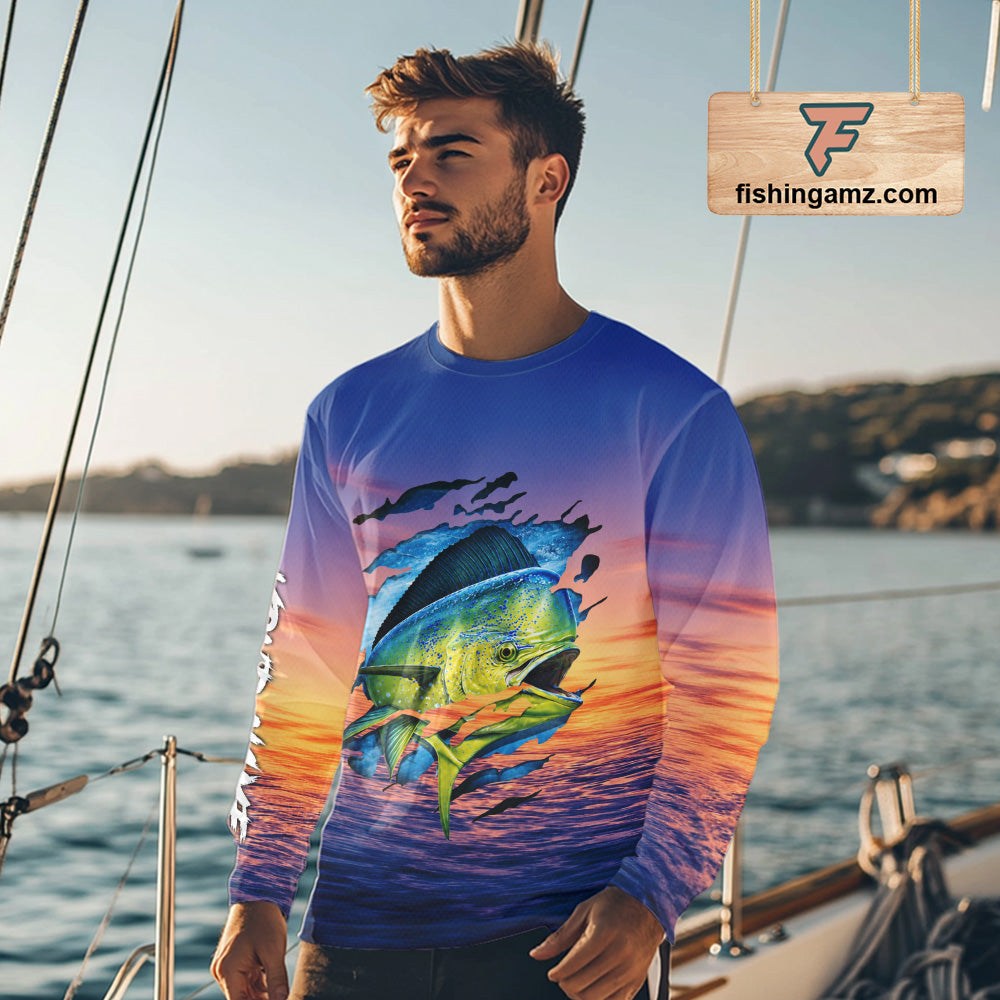 Angler wearing Mahi Mahi Fishing Sunset custom long sleeve mahi mahi offshore fishing shirt on the boat at sunset with personalized name.