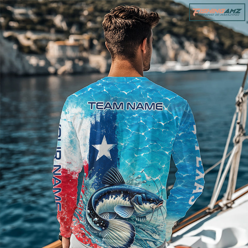 Angler wearing Texas Catfish Fishing Shirt Long Sleeve standing on the boat with custom team name on the back.