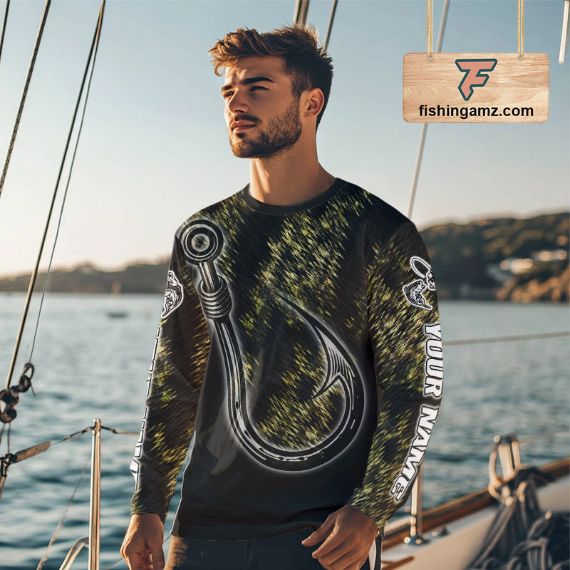 Bass angler wearing custom Fish Hooks long sleeve fishing shirt on a boat